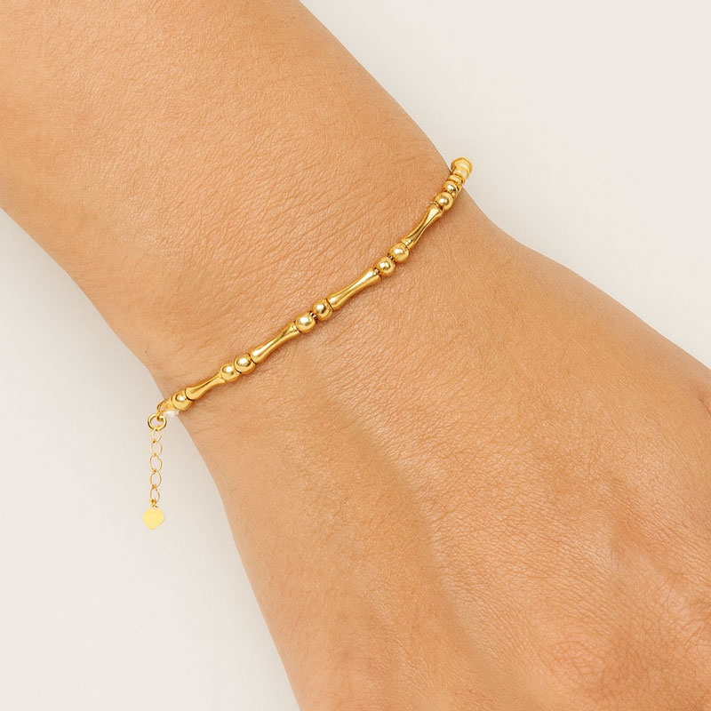 خرید دستبند طلا دو گوی و بامبو پیوسته